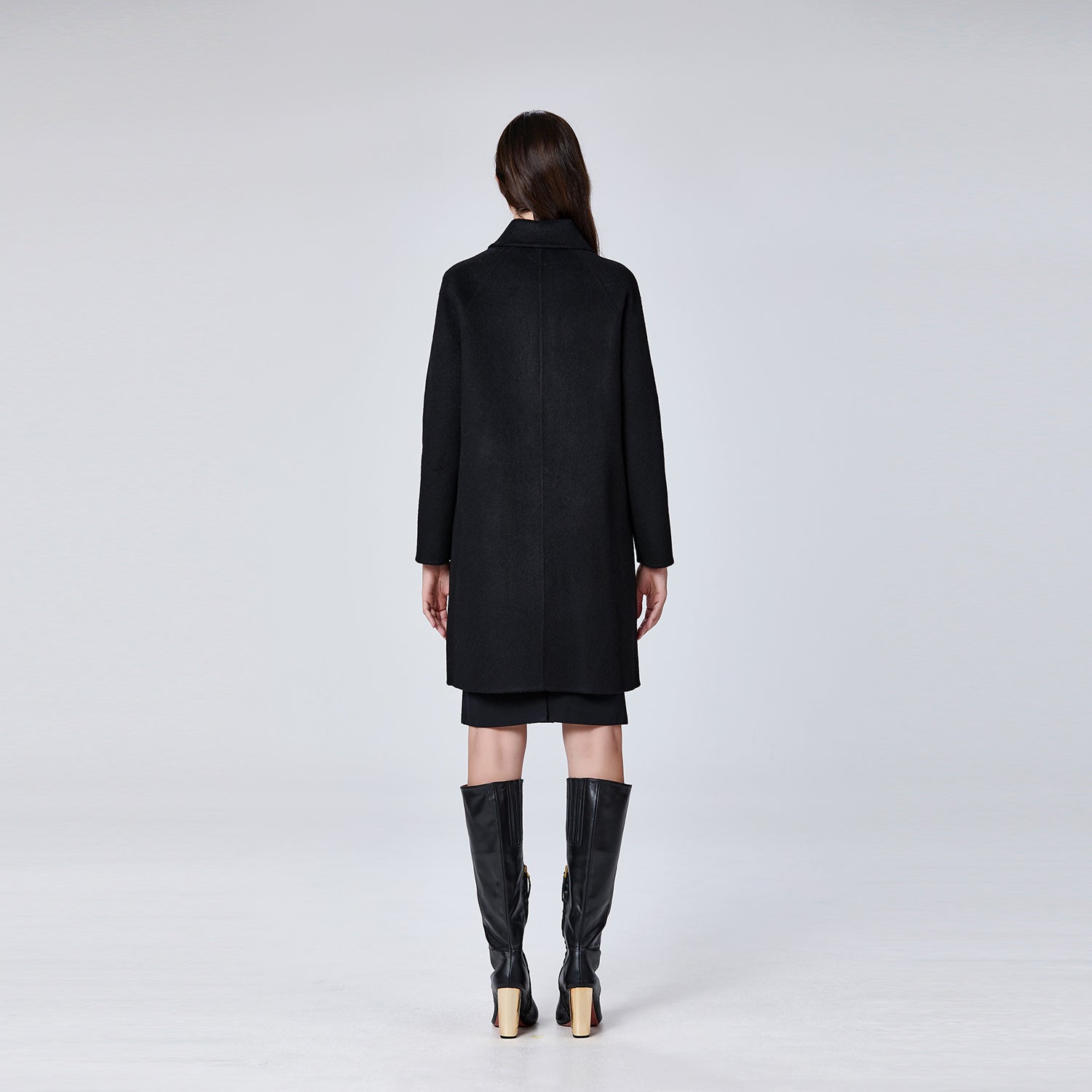 Manteau en laine minimaliste à col rond