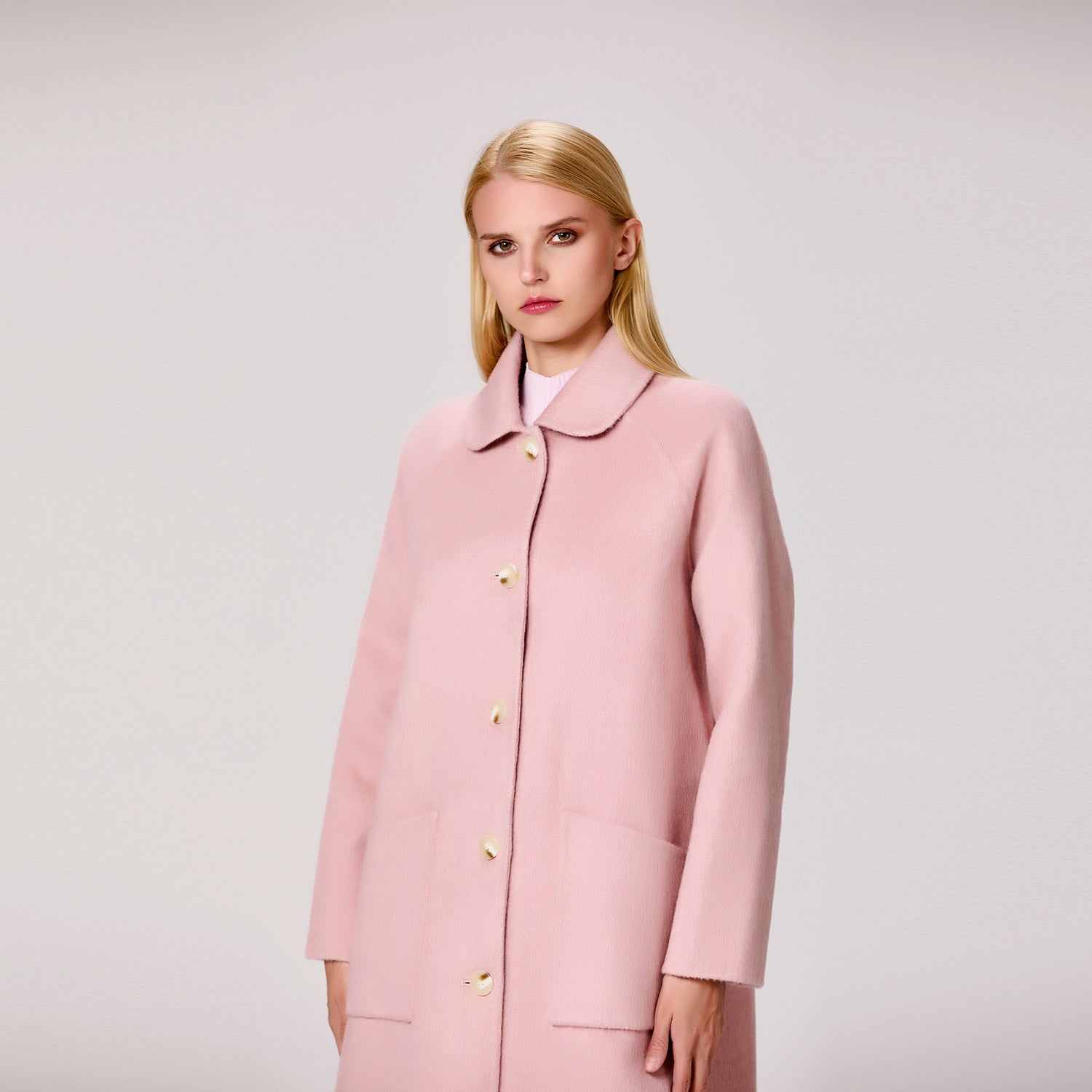 Manteau en laine minimaliste à col rond
