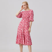Robe smockée manches 3/4 évasée à col carré et imprimé floral