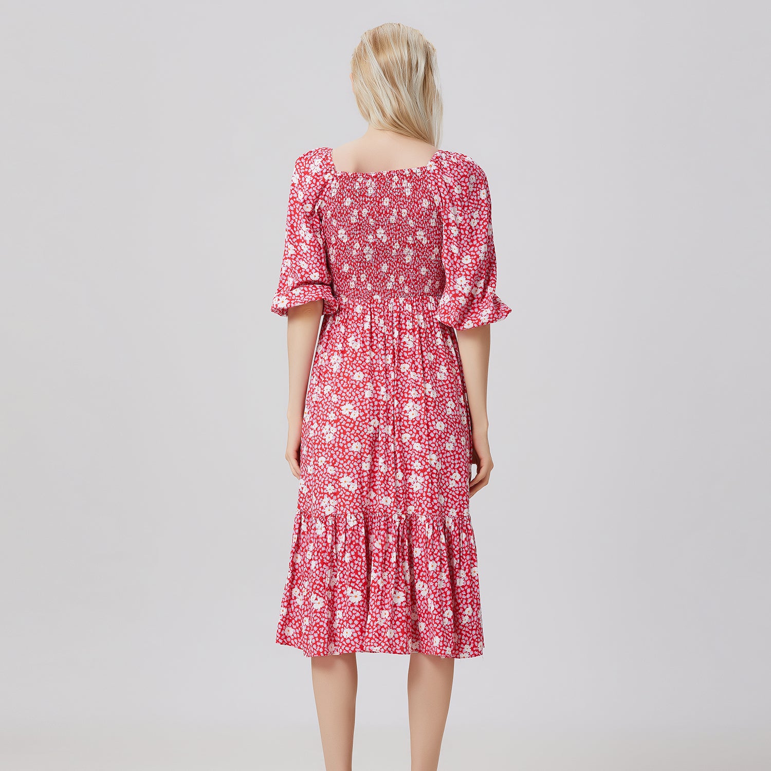 Robe smockée manches 3/4 évasée à col carré et imprimé floral