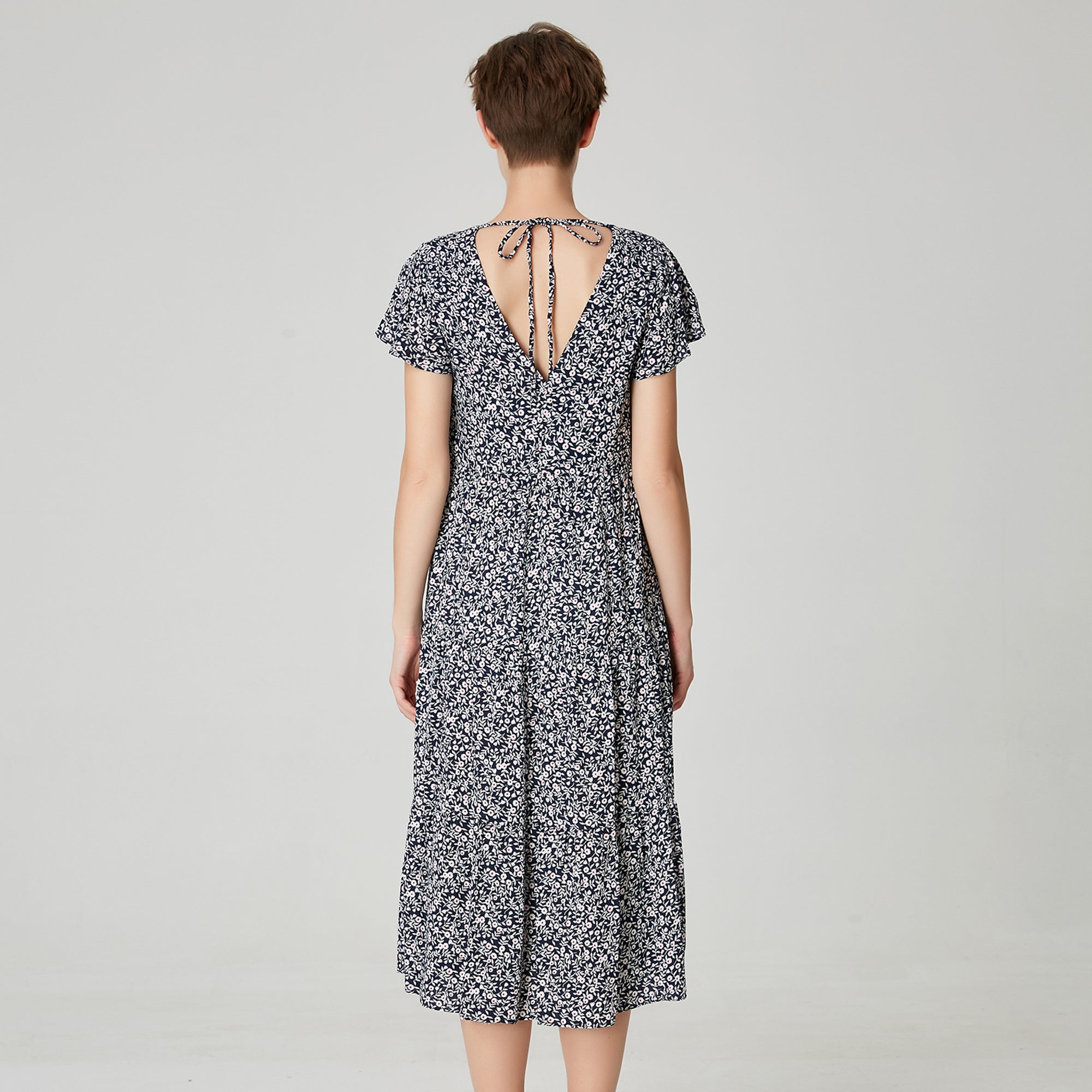 Robe tunique ample à imprimé floral et échancrure dos
