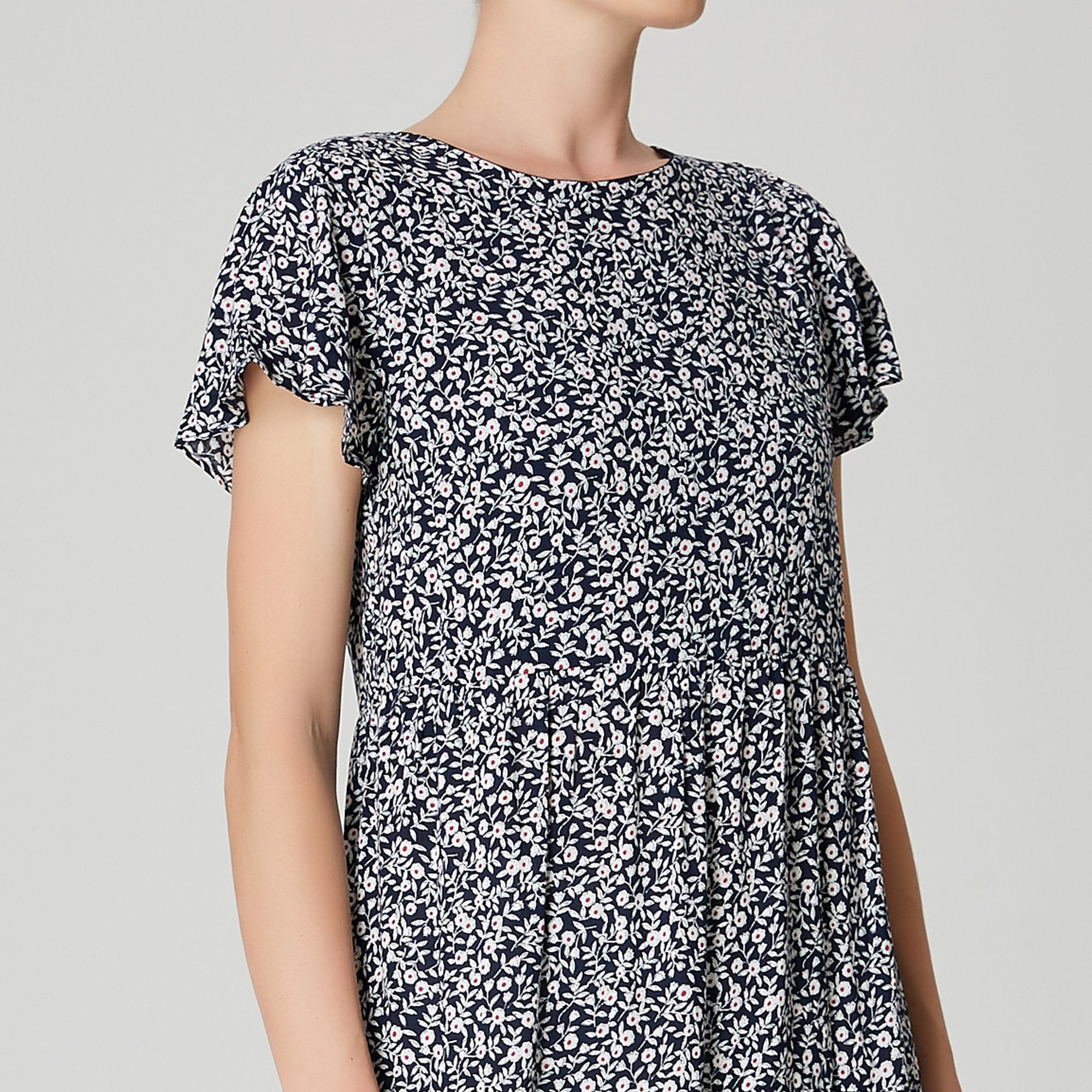 Robe tunique ample à imprimé floral et échancrure dos