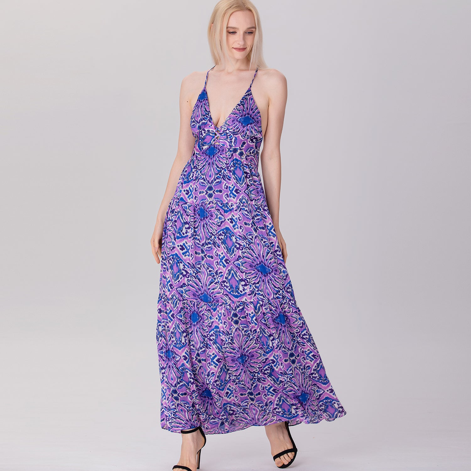 Robe longue dos nu à bretelles et empiècements évasés
