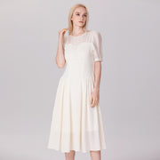 Robe bi-matière à découpe bustier