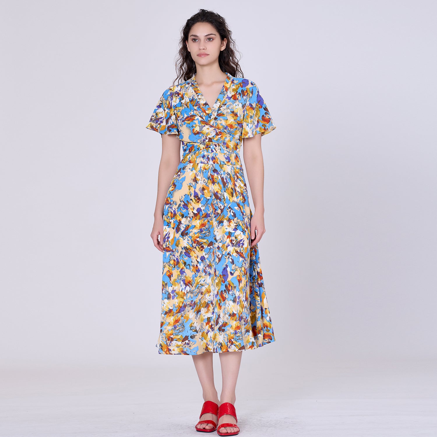 Robe midi à effet croisé et imprimé abstrait