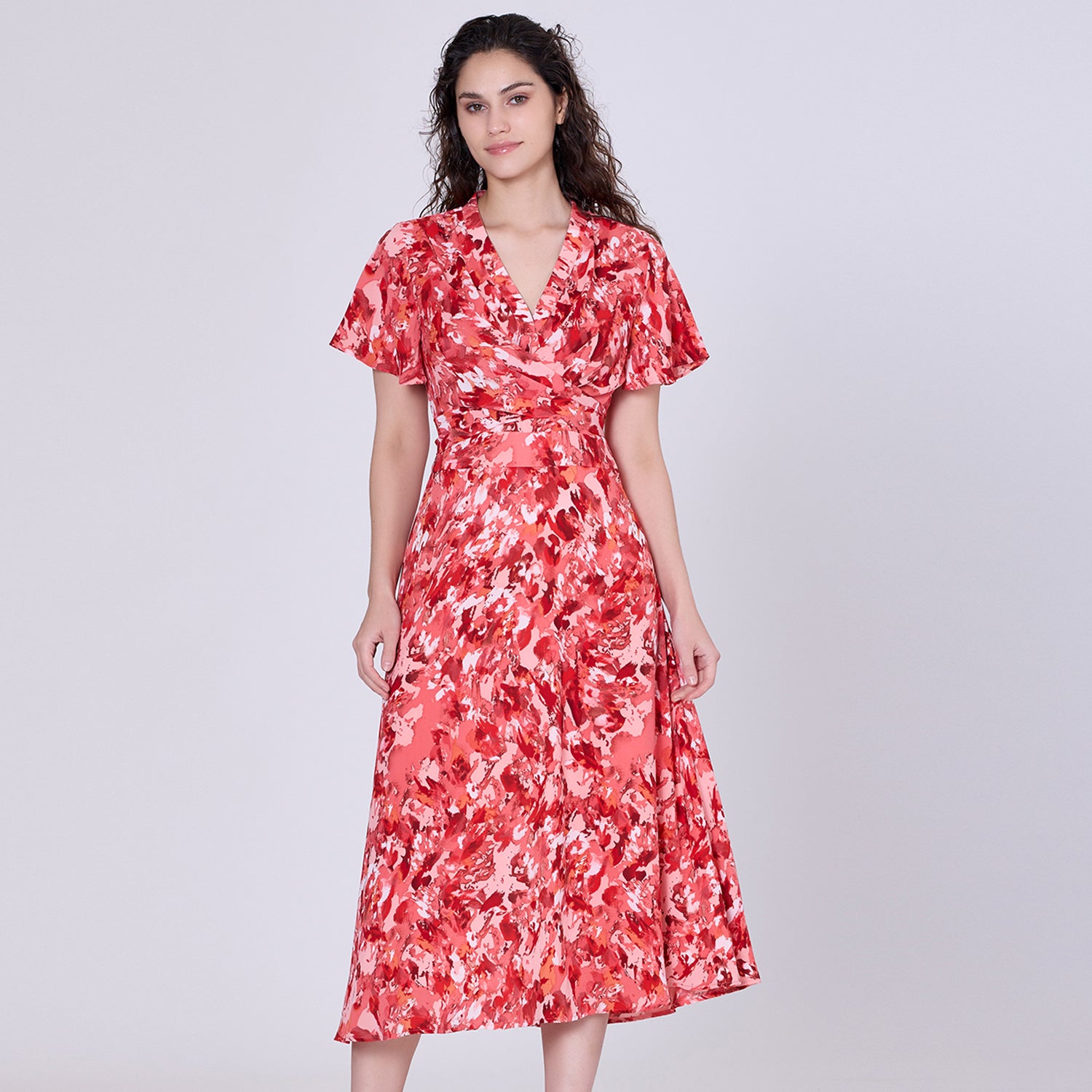 Robe midi à effet croisé et imprimé abstrait