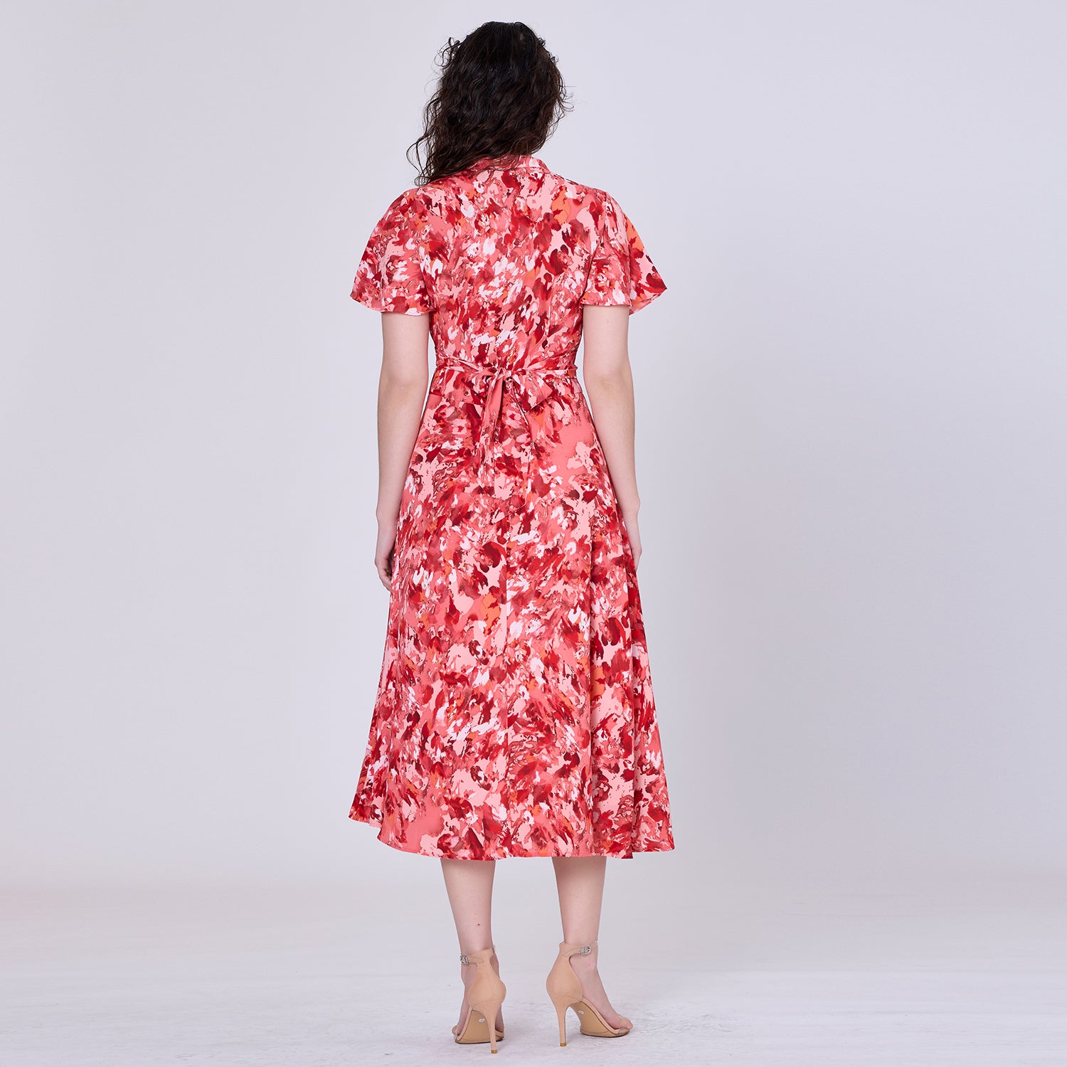Robe midi à effet croisé et imprimé abstrait