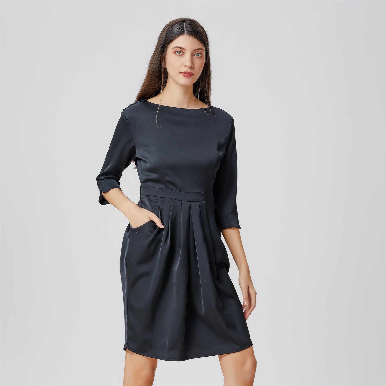 Robe taille soulignée et plis