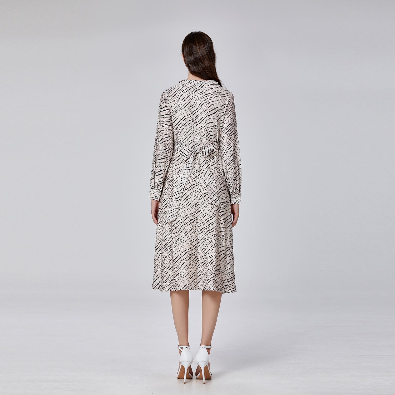 Robe imprimée à décolleté en V et drapé croisé